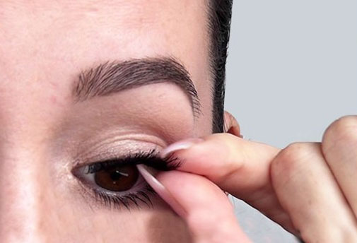 Position the lash on top of your natural lashes.
